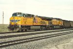 Loaded coal train rolls south